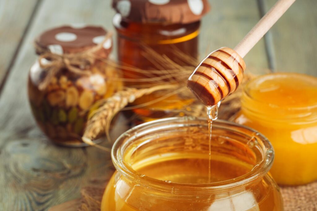 100% pure organic honey in glass bottles.